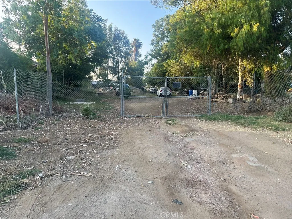 21580 Lane Perris Ca Perris, CA 92570 - Photo 5 of 6 a backyard of a house with lots of green space