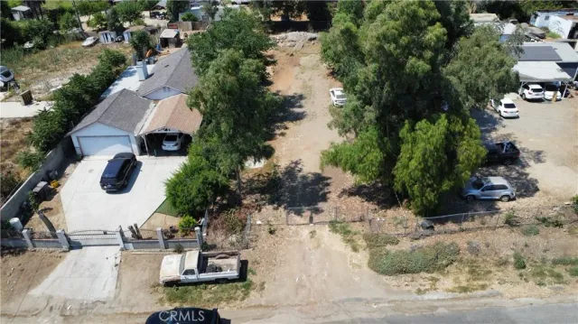 an aerial view of house with yard