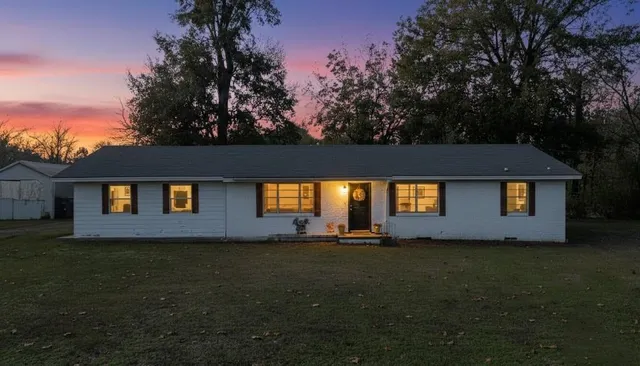 a house view with a garden space