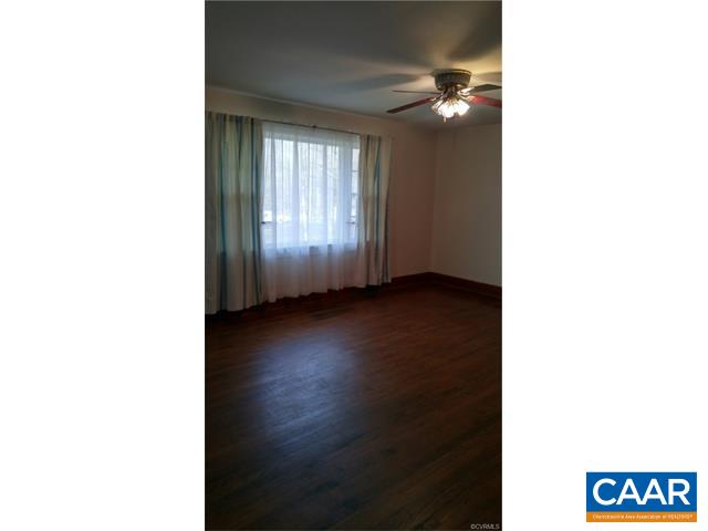 343 Lee Wayside Road Buckingham, VA 23921 - Photo 13 of 18 a view of an empty room with a window and a mirror