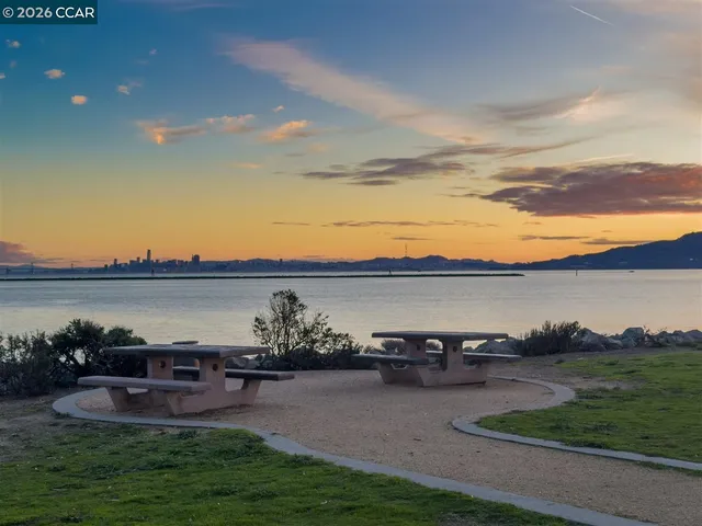 a view of a street with a building in the background