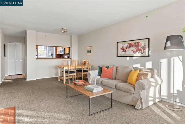 a living room with furniture and window