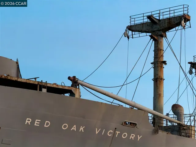 a view of a street with cars
