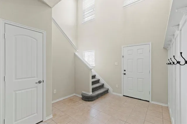 a view of an entryway with hallway
