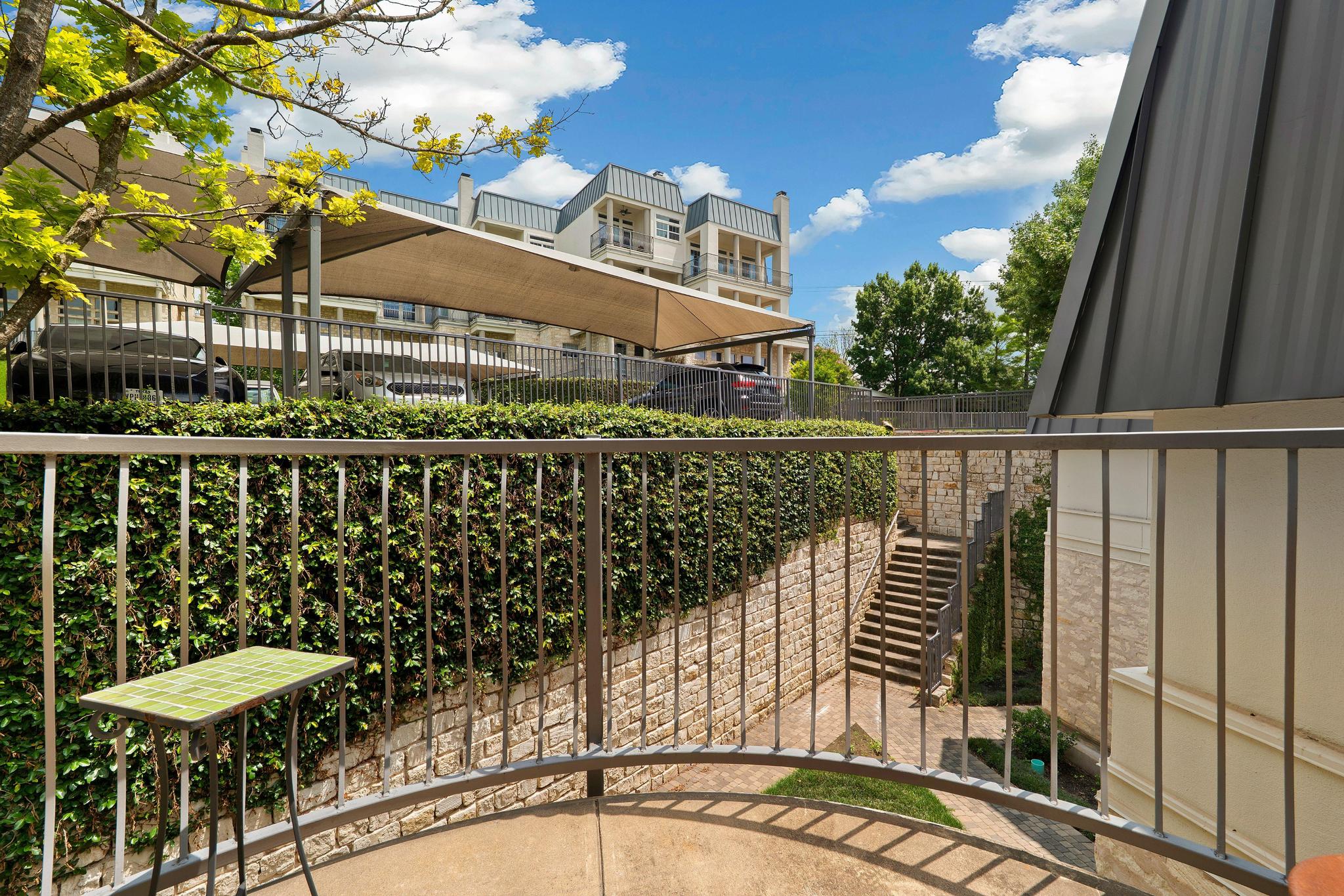 2918 Ranch Road 620, Unit J162 Austin, TX 78734 - Photo 25 of 26 Juliet Balcony overlooking courtyard entrance