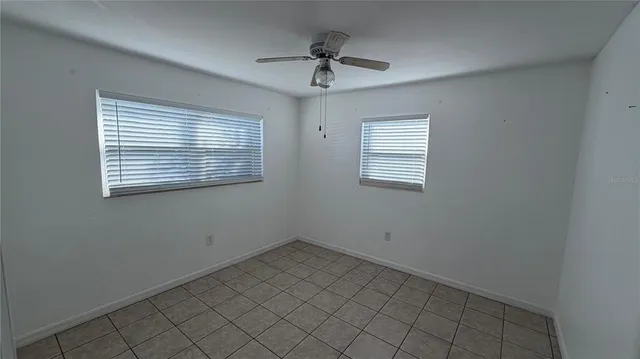 a view of a room that has a window in it