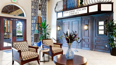 a view of a chairs and table in the patio