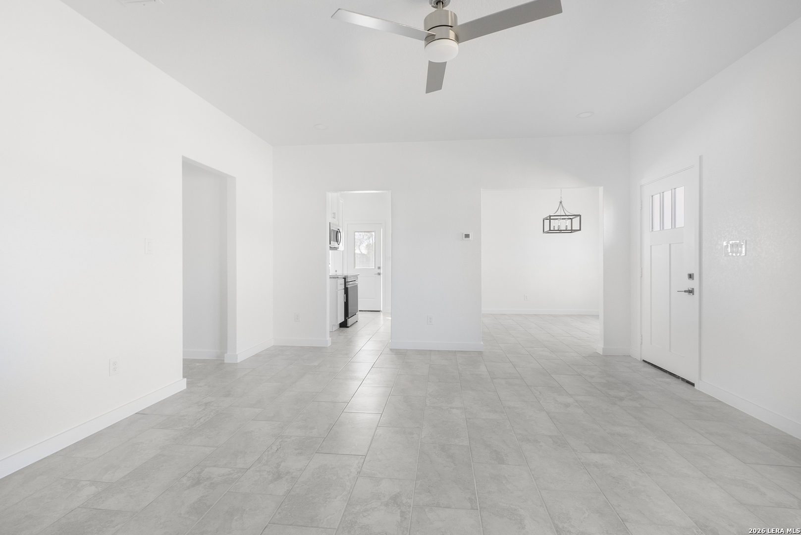 804 Peach Street Jourdanton, TX 78026 - Photo 3 of 16 a view of an empty room