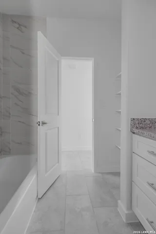 a bathroom with a tub