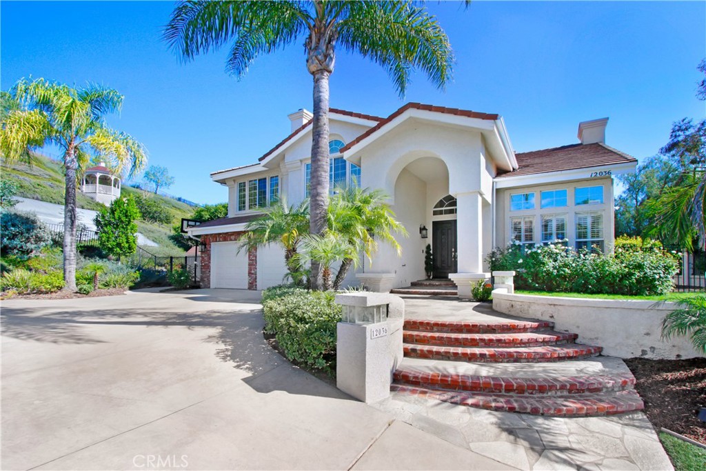 12036 Wood Ranch Road Granada Hills, CA 91344 - Photo 2 of 55 Situated up away from street providing privacy.