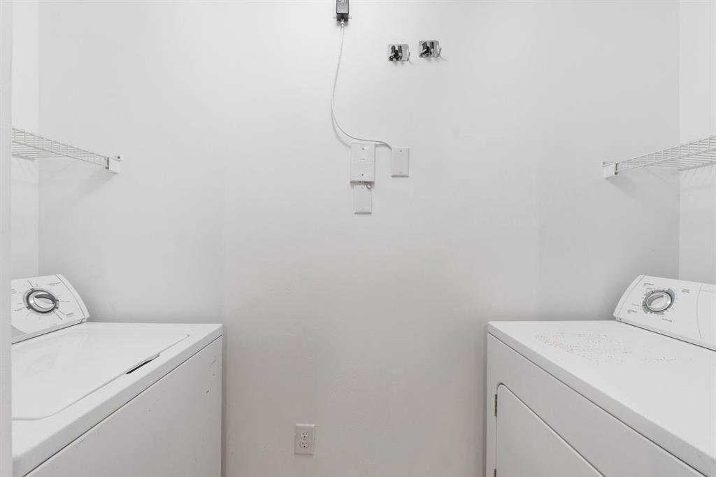 5800 West Sample Road, Unit 102 Coral Springs, FL 33067 - Photo 9 of 23 a utility room with dryer and washer