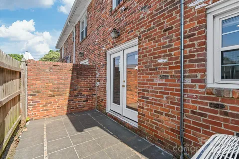 a brick building with a street
