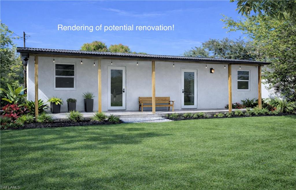 5370 Holland Street Naples, FL 34113 - Photo 2 of 7 Rear view of house featuring a yard, stucco siding, and a patio
