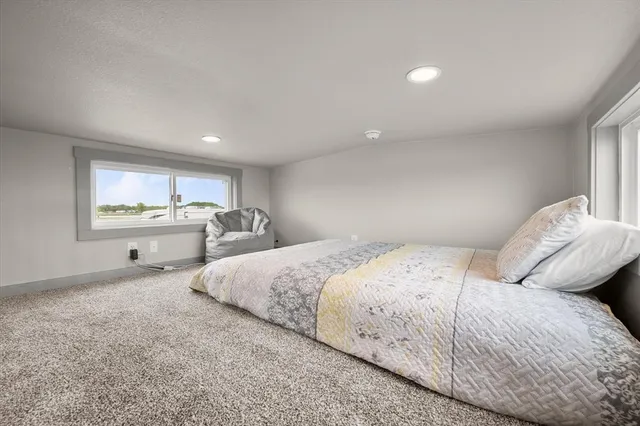 a view of a swimming pool is in the middle of a lake