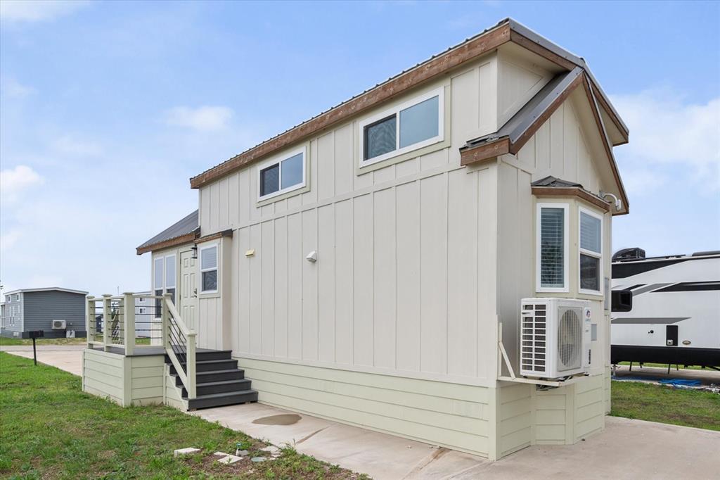 6388 Peninsula Road Kerens, TX 75144 - Photo 30 of 38 a front view of a house with a yard