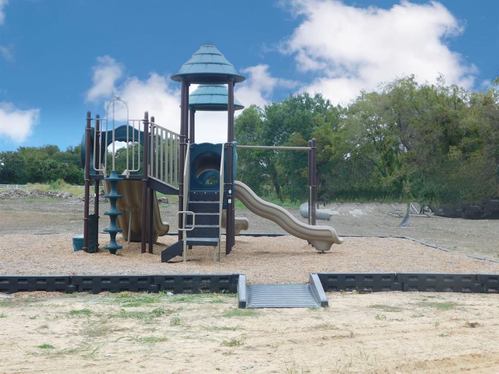 6388 Peninsula Road Kerens, TX 75144 - Photo 37 of 38 a view of a house with a park