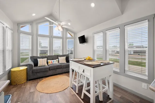 a view of a dining room with furniture window and outside view