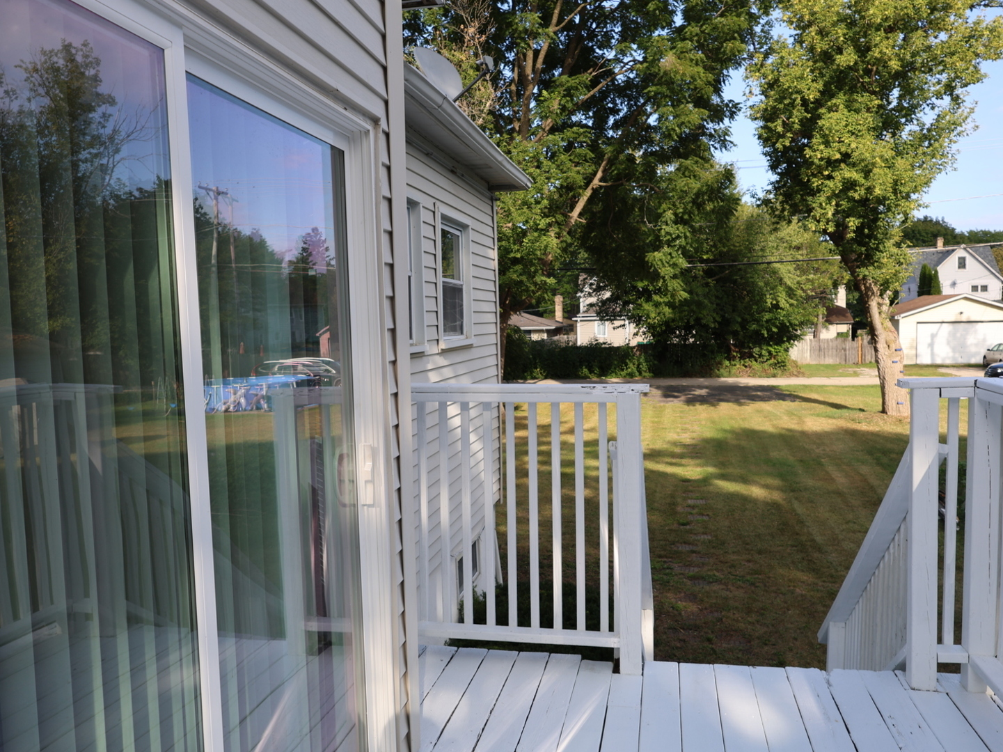2911 Emmaus Avenue Zion, IL 60099 - Photo 4 of 28 a view of a balcony with wooden floor