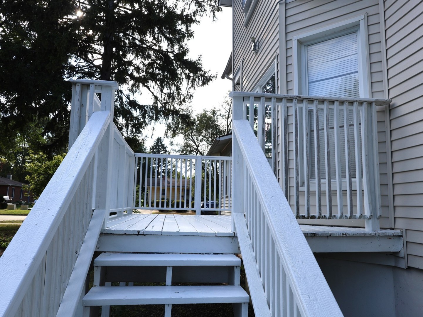 2911 Emmaus Avenue Zion, IL 60099 - Photo 5 of 28 a view of deck with wooden floor and fence and a pot