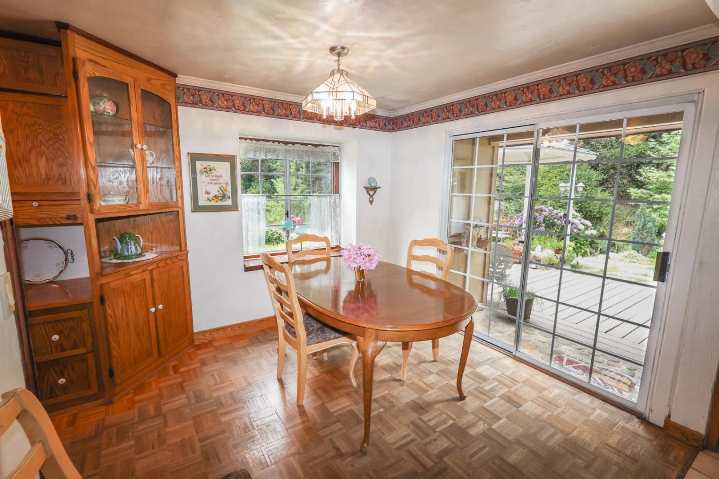 2007 Green Valley Road Watsonville, CA 95076 - Photo 13 of 52 a dining room with furniture a chandelier and window