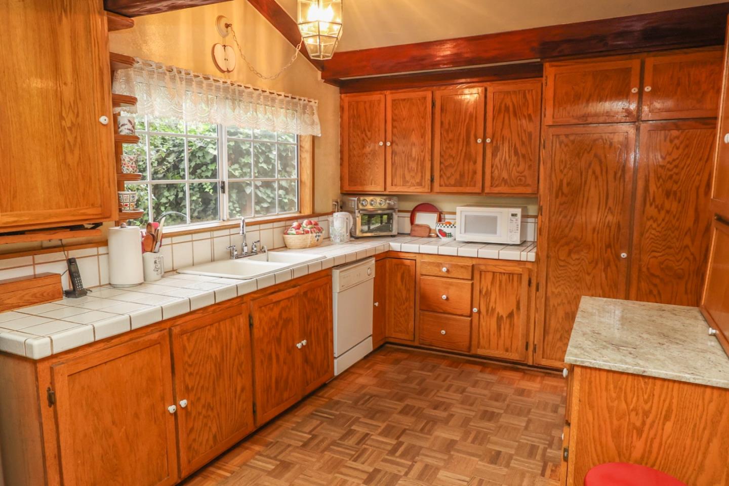 2007 Green Valley Road Watsonville, CA 95076 - Photo 15 of 52 a kitchen with a sink stove and cabinets