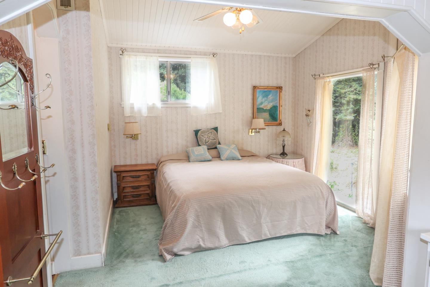 2007 Green Valley Road Watsonville, CA 95076 - Photo 18 of 52 a bedroom with a bed and a mirror