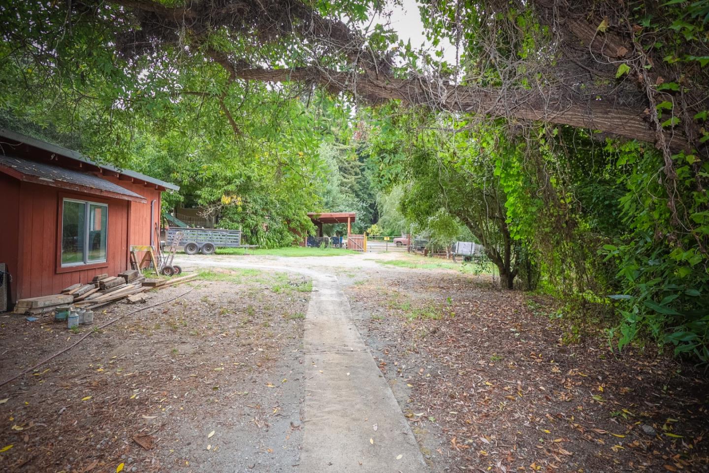 2007 Green Valley Road Watsonville, CA 95076 - Photo 28 of 52 a view of a house with backyard and tree