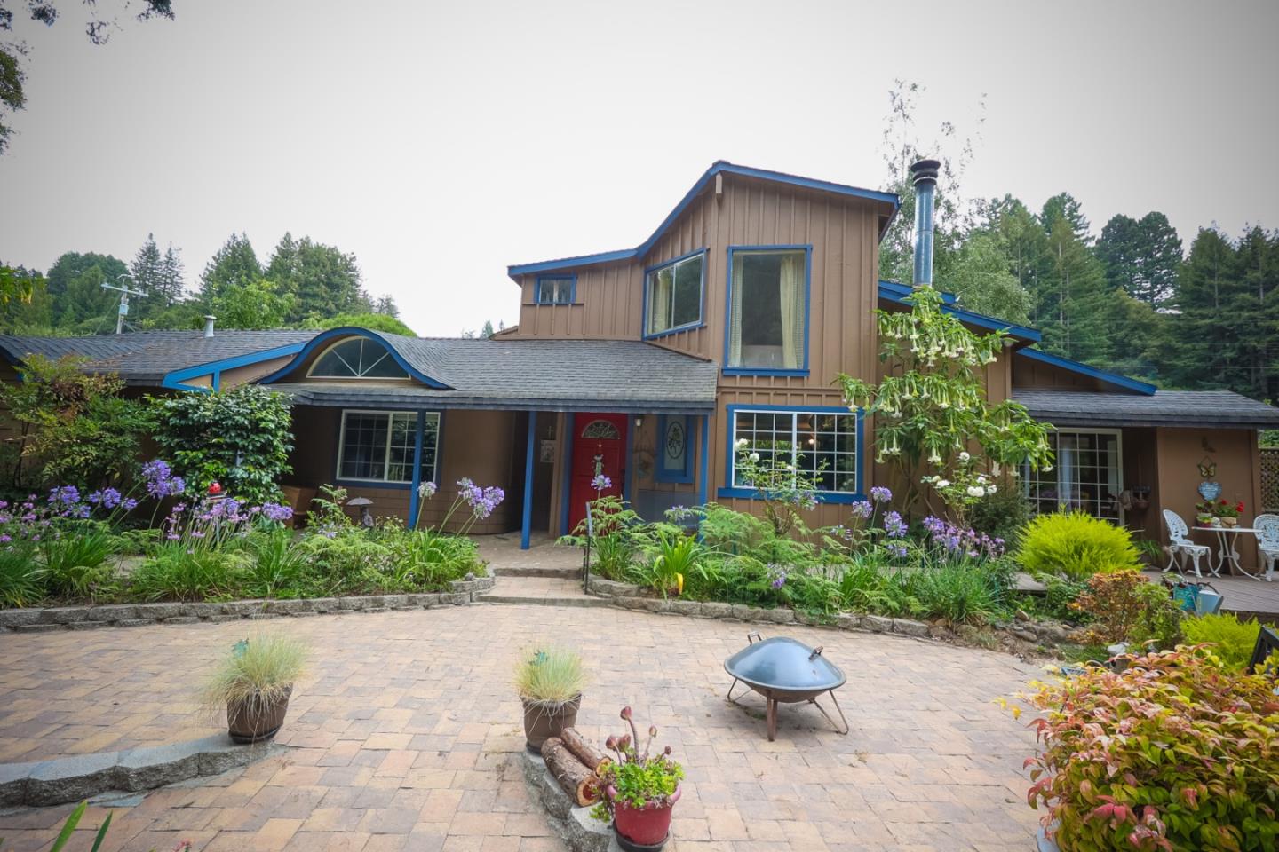 2007 Green Valley Road Watsonville, CA 95076 - Photo 5 of 52 a front view of a house with a yard and a garden
