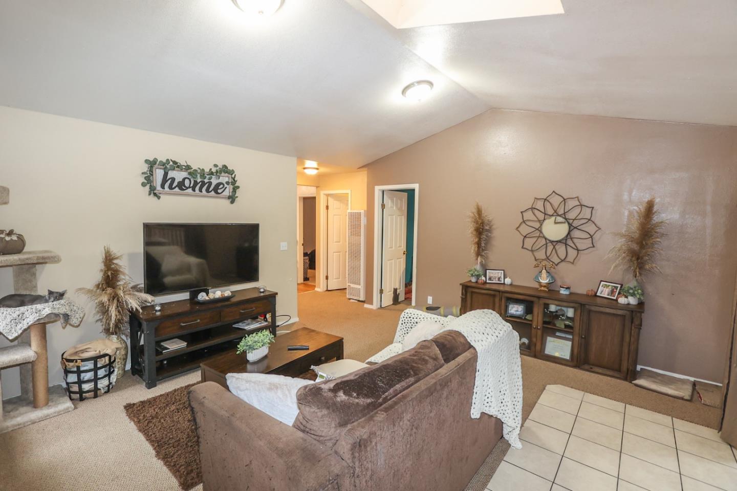 2007 Green Valley Road Watsonville, CA 95076 - Photo 44 of 52 a living room with furniture and a flat screen tv