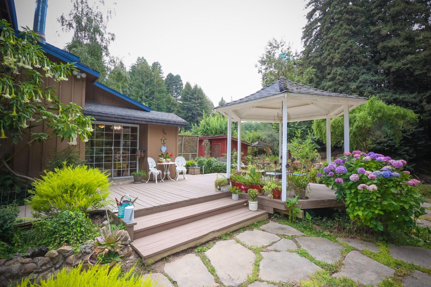2007 Green Valley Road Watsonville, CA 95076 - Photo 6 of 52 a view of a chair and tables in the garden