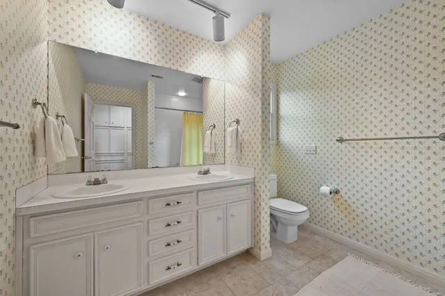 a view of balcony with wooden floor