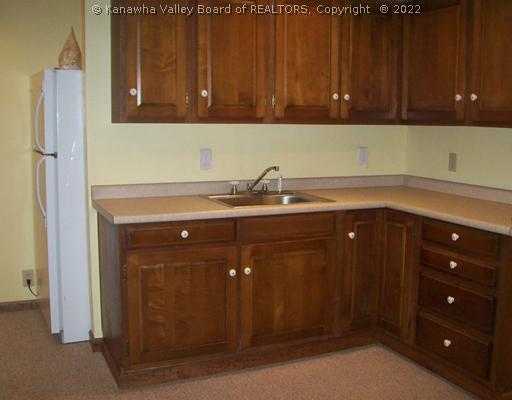 1603 Greystone Road Charleston, WV 25314 - Photo 13 of 16 Other. Kitchenette Area in Lower level Family Room. Wood Burning Fireplace to the Left of Picture