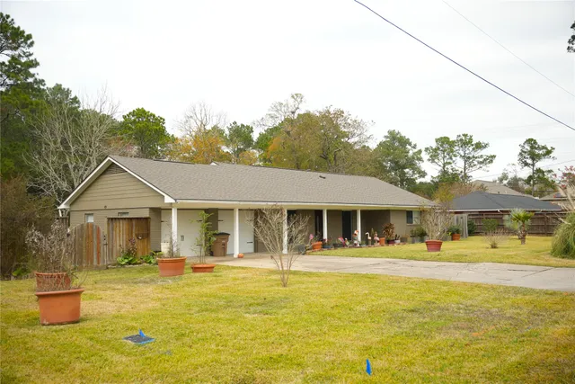 a front view of a house with a swimming pool