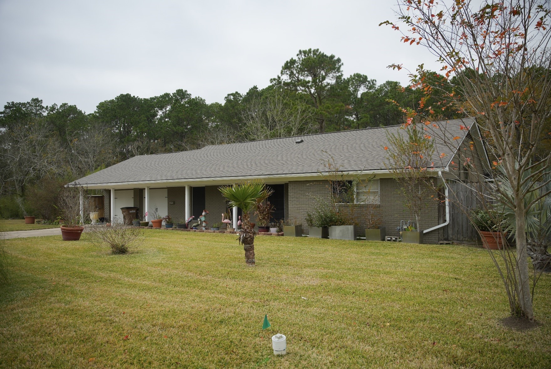 2117 Pecan Street Dickinson, TX 77539 - Photo 2 of 12 a view of a house with a backyard