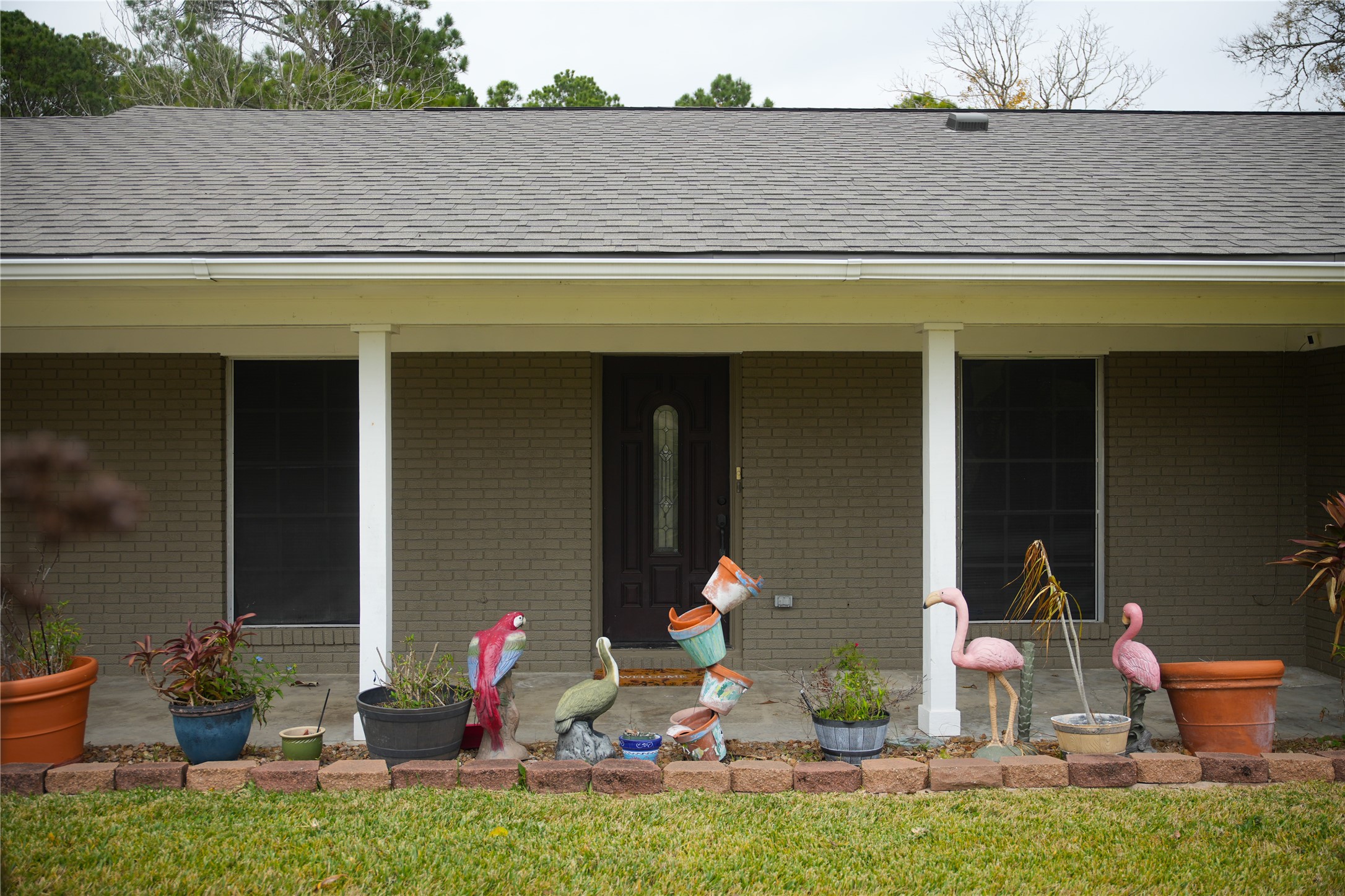 2117 Pecan Street Dickinson, TX 77539 - Photo 3 of 12 a front view of a house having patio