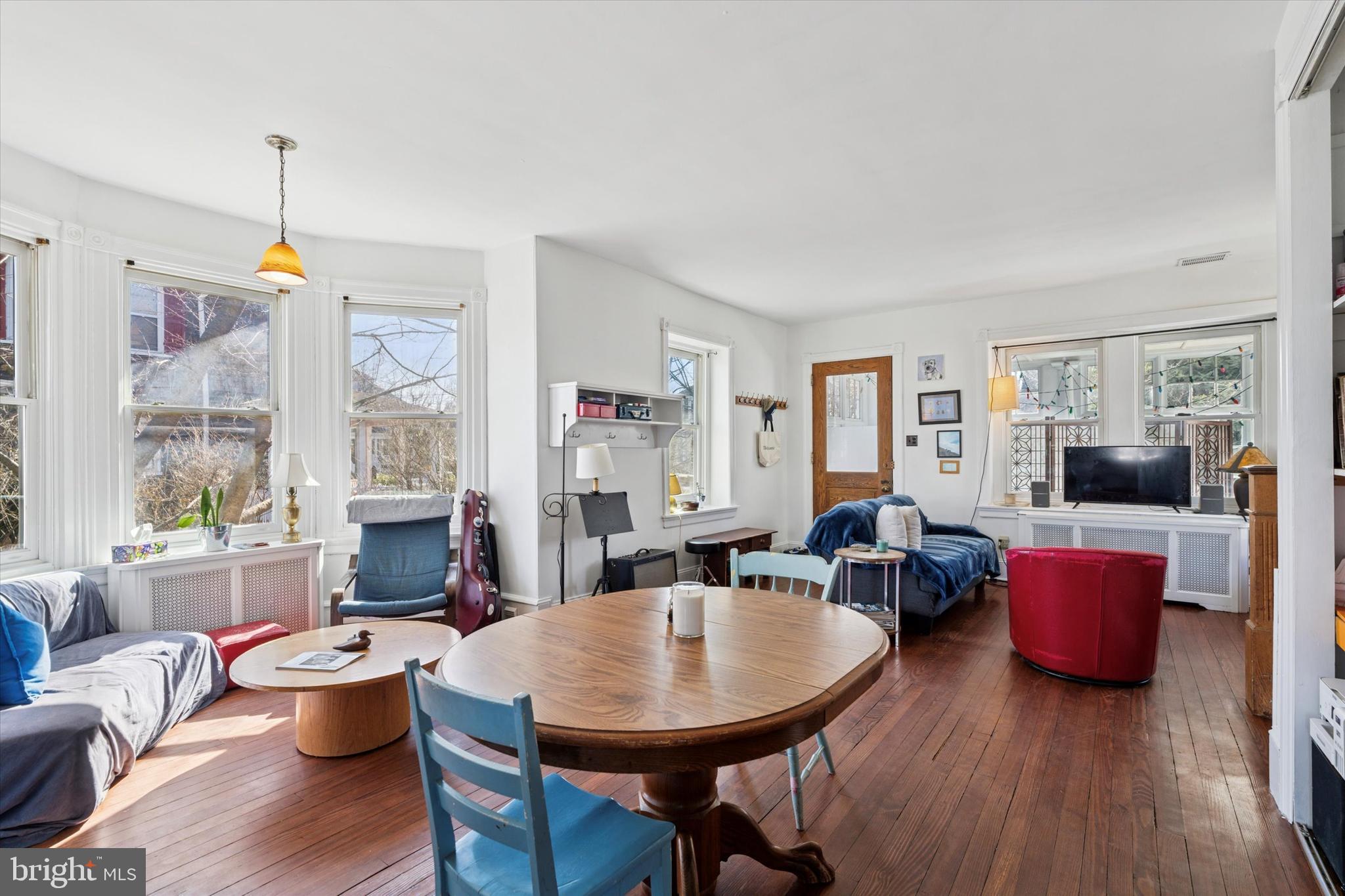 305 Grayling Avenue Narberth, PA 19072 - Photo 14 of 40 a view of a dining room with furniture window and wooden floor