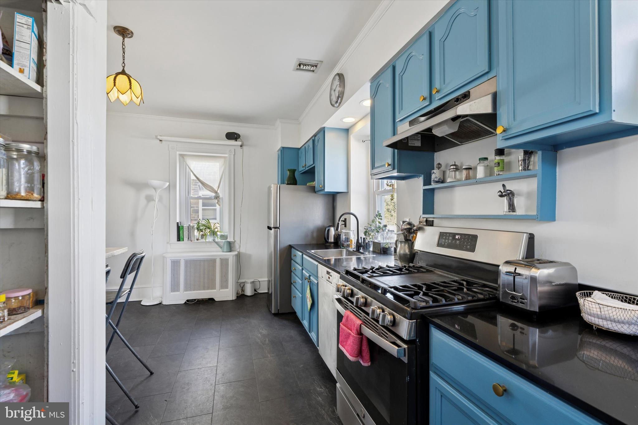 305 Grayling Avenue Narberth, PA 19072 - Photo 18 of 40 a kitchen with stainless steel appliances granite countertop a stove and a sink