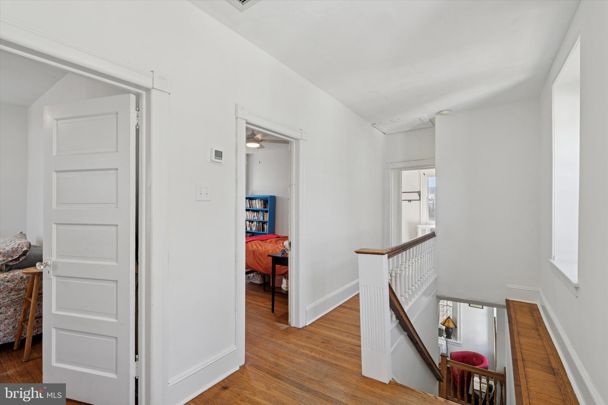 305 Grayling Avenue Narberth, PA 19072 - Photo 19 of 40 a view of hallway with wooden floor and stairs