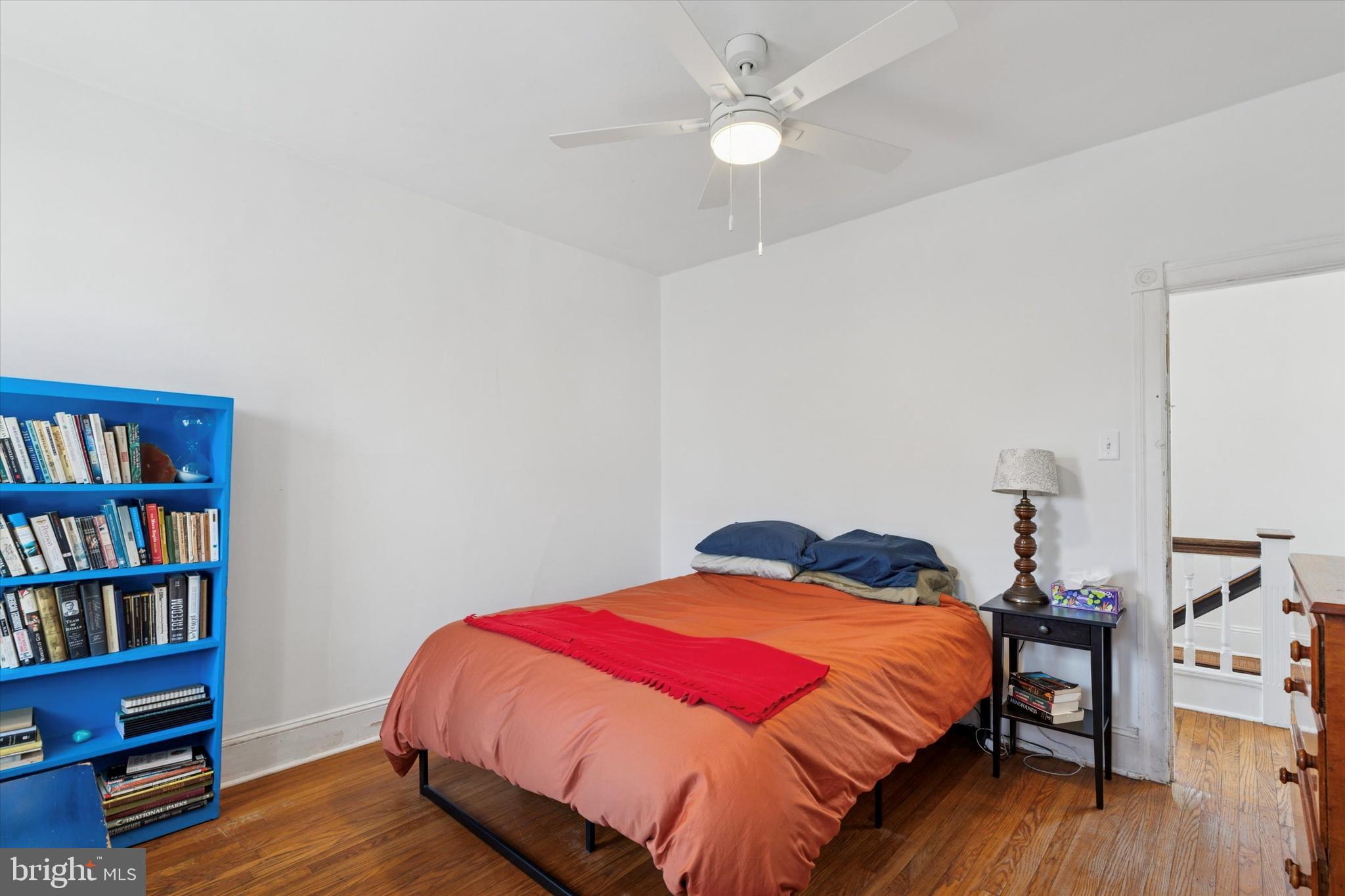 305 Grayling Avenue Narberth, PA 19072 - Photo 25 of 40 a bedroom with a bed and a book shelf