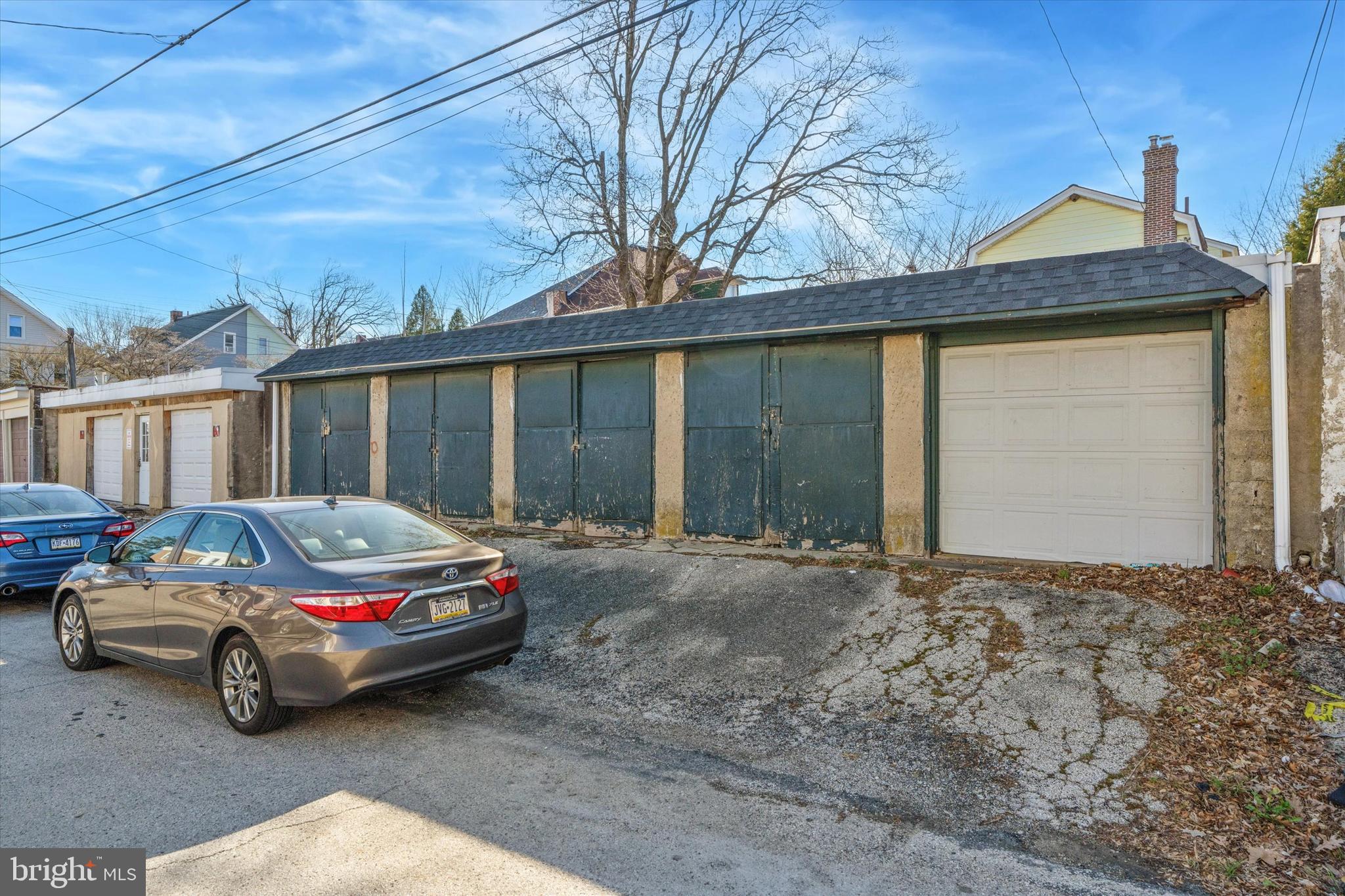 305 Grayling Avenue Narberth, PA 19072 - Photo 36 of 40 a car parked in front of a house