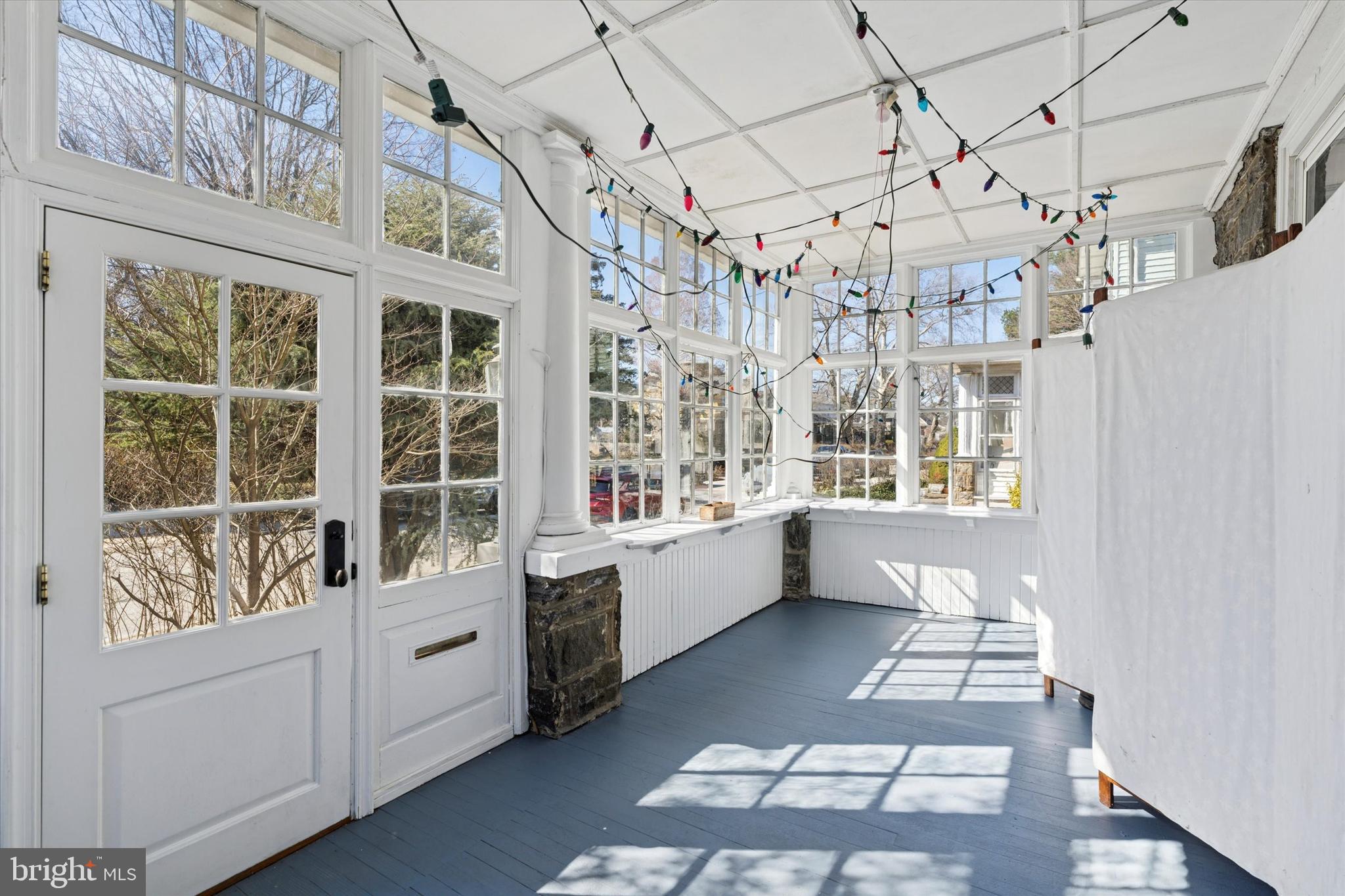 305 Grayling Avenue Narberth, PA 19072 - Photo 5 of 40 a large white building with glass door