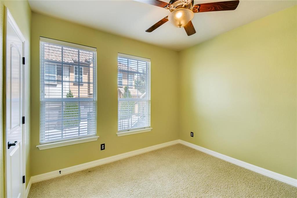 11929 Terraza Circle, Unit TH37 Austin, TX 78726 - Photo 12 of 17 a view of an empty room with a window