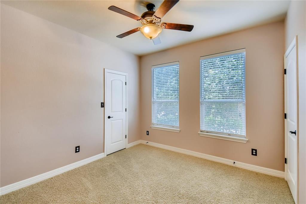 11929 Terraza Circle, Unit TH37 Austin, TX 78726 - Photo 13 of 17 a view of an empty room with a window