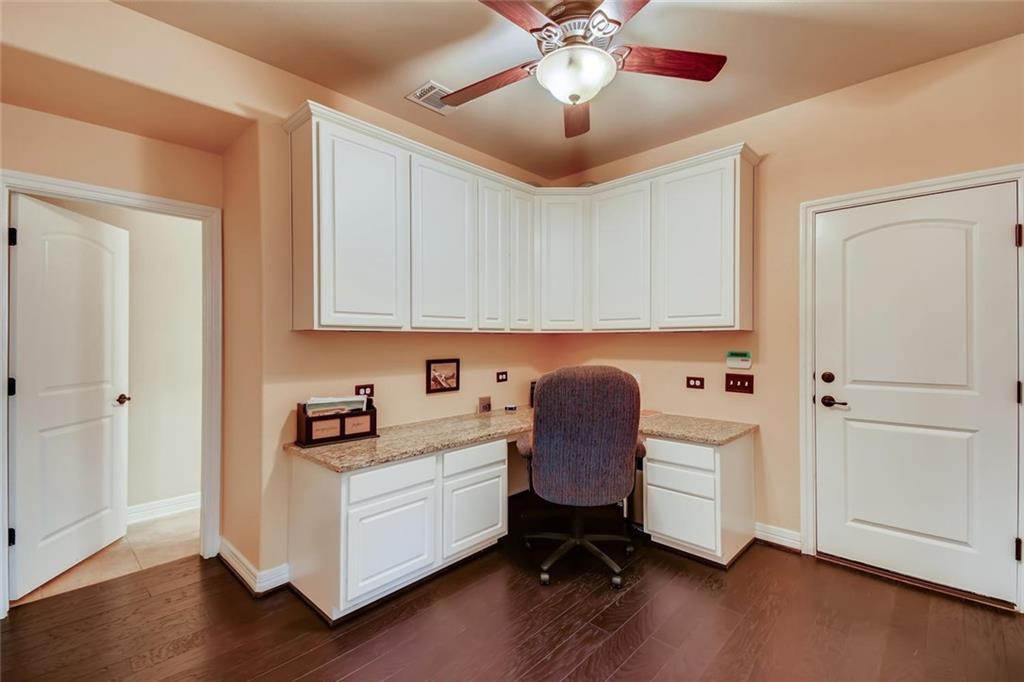 11929 Terraza Circle, Unit TH37 Austin, TX 78726 - Photo 15 of 17 a living room with furniture and wooden floor