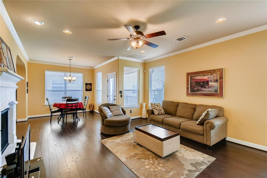 11929 Terraza Circle, Unit TH37 Austin, TX 78726 - Photo 2 of 17 a living room with furniture and a large window