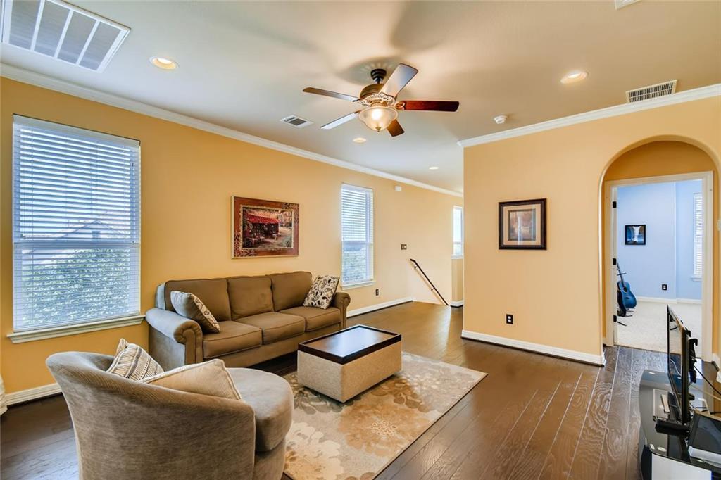 11929 Terraza Circle, Unit TH37 Austin, TX 78726 - Photo 4 of 17 a living room with furniture and a large window