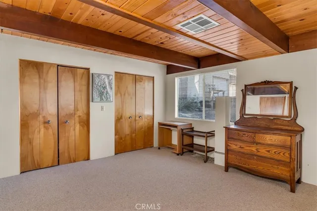 a view of a livingroom with furniture