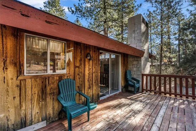 a view of a two chairs in the balcony