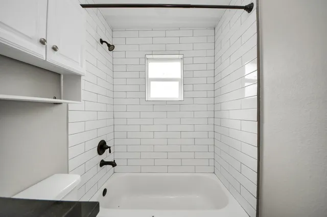 a bathroom with a bathtub