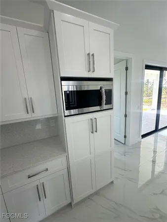 a utility room with washer and dryer